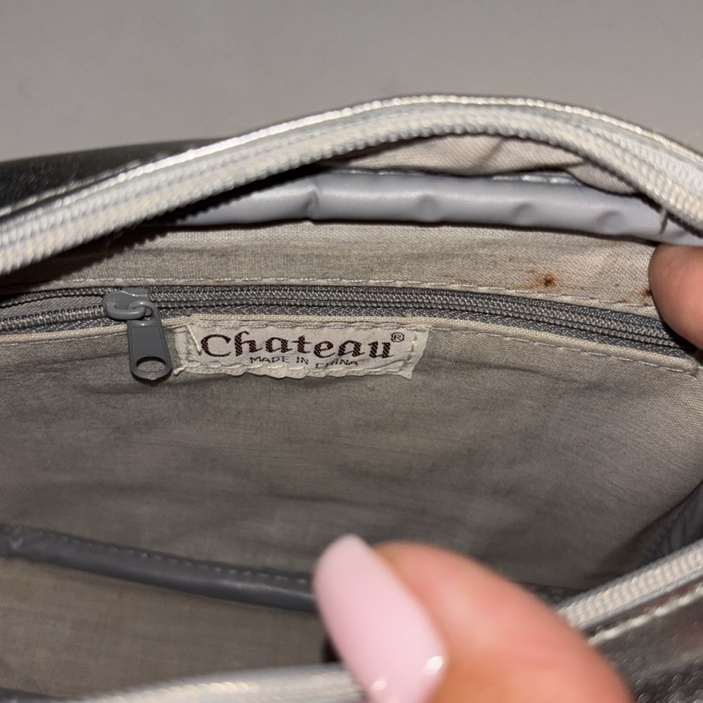 CHATEAU BRAND SILVER QUILTED CROSSBODY BAG WITH TASSEL
SILVER CHAIN STRAP - Picture 7 of 9